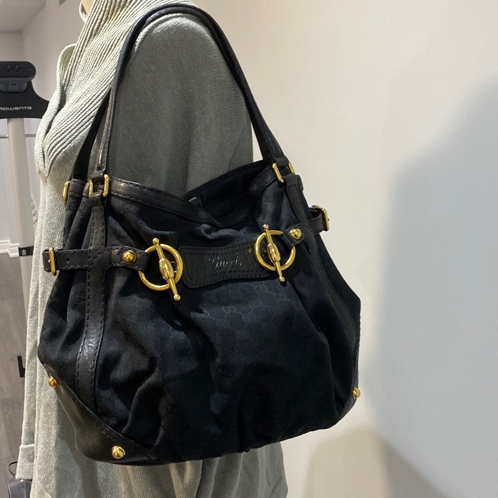 Black Gucci handbag with gold hardware